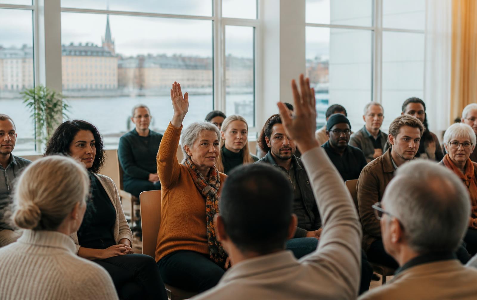 Helsingborgare i dialog på ett öppet medborgarmöte med utsikt mot vattnet
